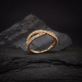 Media churumbela con cristales elaborada en oro amarillo de 14k