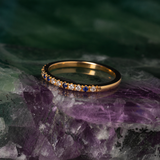 Media churumbela con 8 zafiros y 12 topacios naturales elaborada en oro rosa de 14k