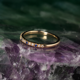 Media churumbela con 8 zafiros y 12 topacios naturales elaborada en oro rosa de 14k