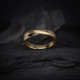 Argolla de matrimonio maciza de 4mm elaborada en oro amarillo de 18k