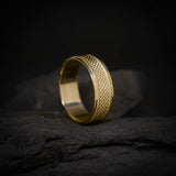 Argolla de matrimonio maciza de 7mm elaborada en oro amarillo de 14k