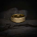 Argolla de matrimonio maciza de 7mm elaborada en oro amarillo de 14k