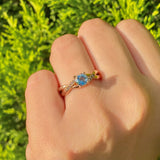 Anillo de compromiso con topacio natural de .50ct corte brillante y 8 diamantes naturales laterales elaborado en oro rosa de 14k