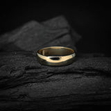 Argolla de matrimonio maciza de 4mm elaborada en oro amarillo de 18k