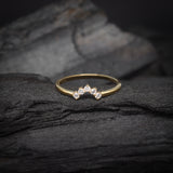 Media churumbela con cristales elaborada en oro amarillo de 14k