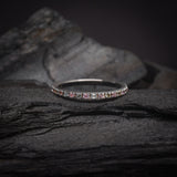 Media churumbela con topacios y zafiros naturales elaborada en oro blanco de 14k