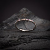 Media churumbela con topacios y zafiros naturales elaborada en oro blanco de 14k