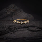 Media churumbela con cristales elaborada en oro amarillo de 18k