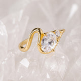 Anillo de compromiso con diamante natural de 1.0ct corte oval con certificación GIA y 1 diamante natural lateral elaborado en oro amarillo de 14k