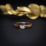 Anillo de compromiso con diamante natural de .20ct elaborado en oro rosa de 14 kilates