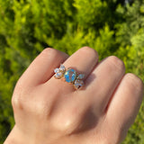 Anillo de compromiso con topacio natural corte oval y 6 diamantes naturales laterales elaborado en oro rosa de 14k