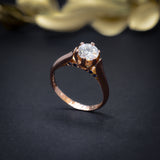 Anillo de compromiso con diamante de laboratorio de 1.0ct corte brillante con certificado IGI y 12 zafiros naturales elaborado en oro rosa de 14k