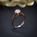 Anillo de compromiso con diamante de laboratorio de 1.0ct corte brillante con certificado IGI y 12 zafiros naturales elaborado en oro rosa de 14k