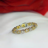 Churumbela con diamantes naturales .50 puntos elaborada en oro amarillo y blanco de 14 kilates