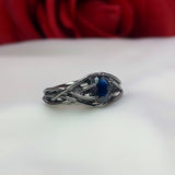 Anillo de compromiso con zafiro natural de .84ct corte oval elaborado en oro de 14k