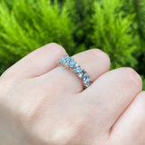 Media churumbela con topacios y 9 diamantes naturales elaborada en oro blanco de 14k