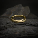 Argolla de matrimonio maciza de 4mm elaborada en oro amarillo de 14k