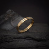 Argolla de matrimonio maciza de 3mm elaborada en oro amarillo y blanco de 14k