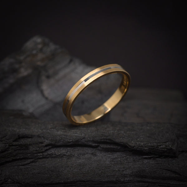 Argolla de matrimonio maciza de 3mm elaborada en oro amarillo y blanco de 14k