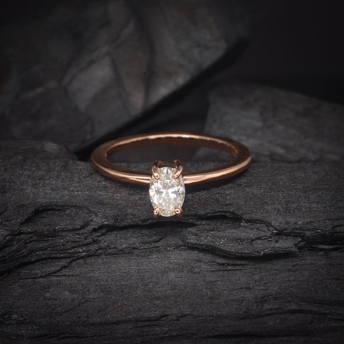 Anillo de compromiso con diamante natural de .65ct con certificación GIA elaborado en oro rosa de 14 kilates