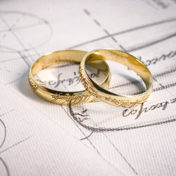 Par de argollas de matrimonio de 4mm macizas personalizadas elaboradas en oro amarillo de 10 kilates