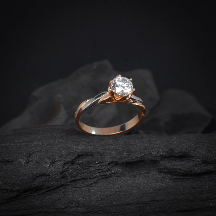 Anillo de compromiso con diamante natural central de 1.0ct con certificación GIA realizado en oro rosa y blanco de 14 kilates