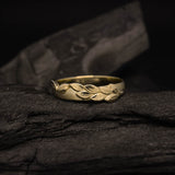 Argolla de matrimonio maciza de 4mm elaborada en oro amarillo de 18k