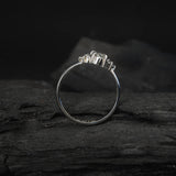 Anillo de compromiso con diamante natural de .50ct corte oval con certificación GIA y 6 diamantes naturales laterales elaborado en oro blanco de 14k