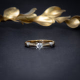 Anillo de compromiso con diamante natural de .20ct elaborado en oro amarillo de 14  kilates