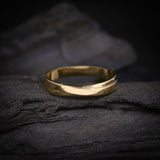 Argolla de matrimonio maciza de 4mm elaborada en oro amarillo de 14k