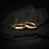 Par de argollas de matrimonio confort light de 5mm elaboradas en oro amarillo de 10k