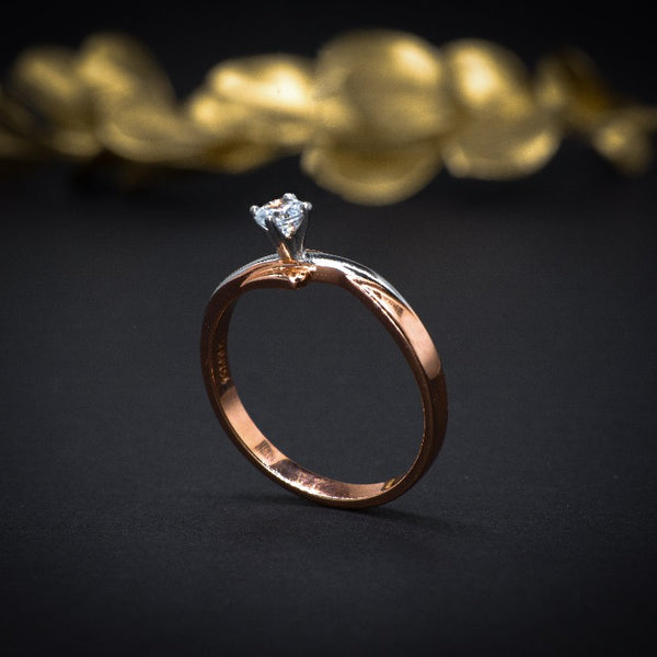Anillo de compromiso con diamante natural de .20ct elaborado en oro rosa de 14 kilates