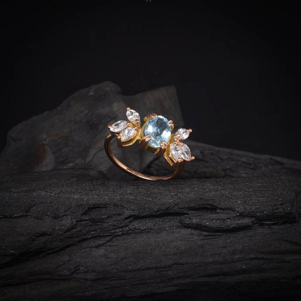 Anillo de compromiso con topacio natural y 6 diamantes naturales laterales elaborado en oro rosa de 14 kilates