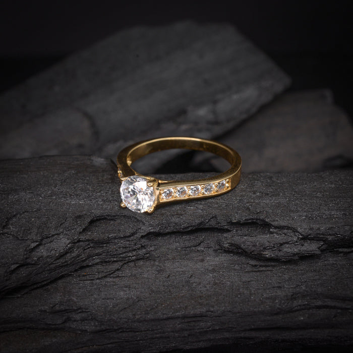 Anillo de compromiso con moissanita de 1 quilate con certificado GRA y cristales laterales elaborado en oro amarillo de 14 kilates