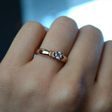 Anillo de compromiso con moissanita de .20ct realizado en oro rosa de 14 kilates